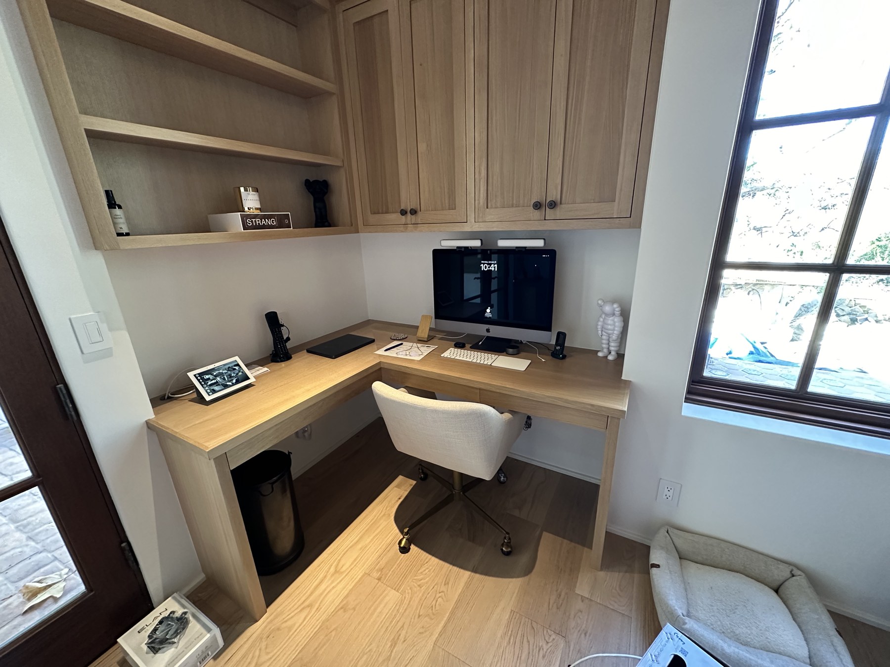 Home office with a tabletop touchscreen on the built-in desk